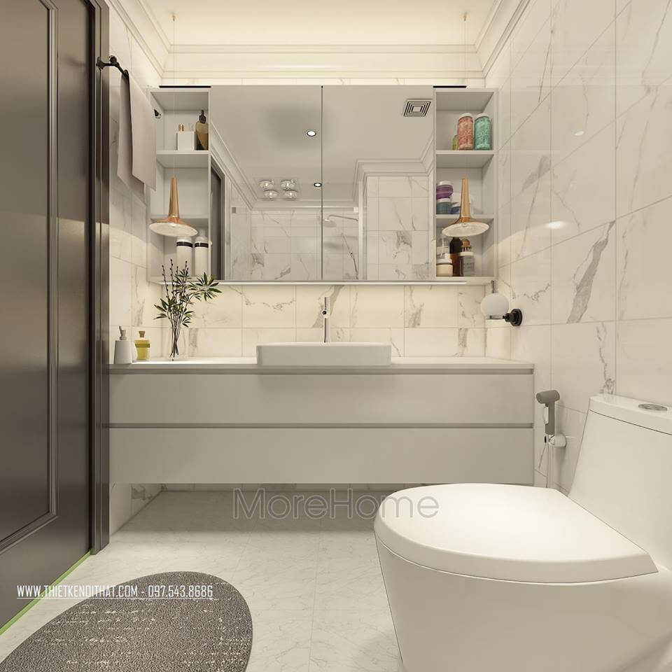 Phòng WC được thiết kế khá sang chảnh, với màu đá nhân tạo ốp tường màu trắng kết hợp vách kính cường lực 180 độ. Mẫu bàn rửa mặt kết hợp kệ đựng đồ thông minh giúp cho không gian phòng tắm chung thêm sạch sẽ, hiện đại và đa năng. đá ốp tường phòng tắm