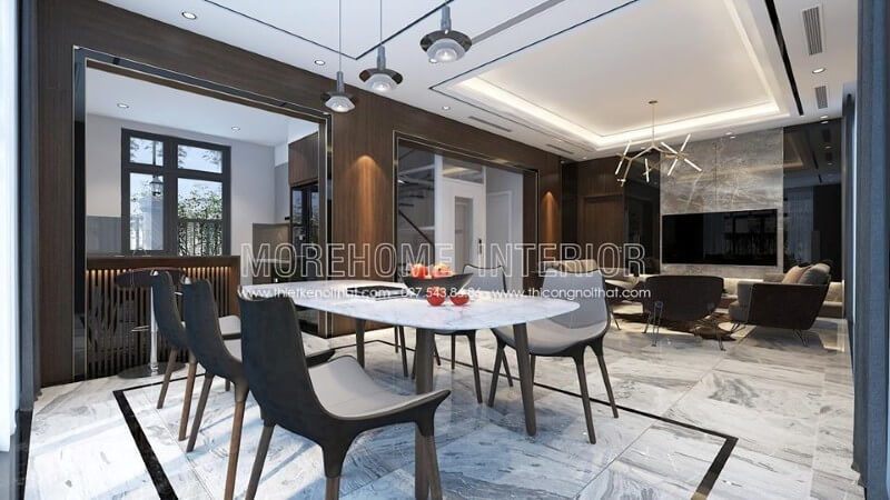 . Bộ bàn ăn hiện đại với mẫu ghế mới lạ được đặt bên cạnh của sổ kính tạo nên một không gian sang trọng và lãng mạn cho bữa cơm gia đình.